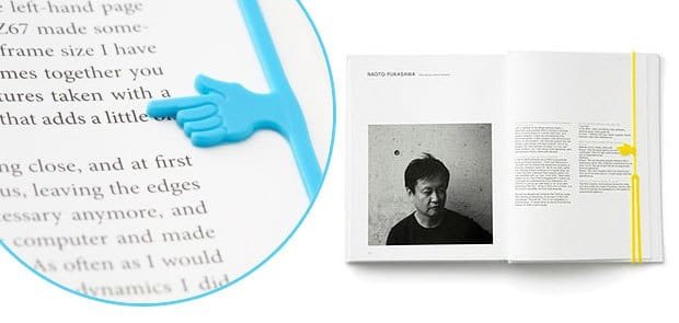 Keep the exact place in a book with a pointing finger bookmark
