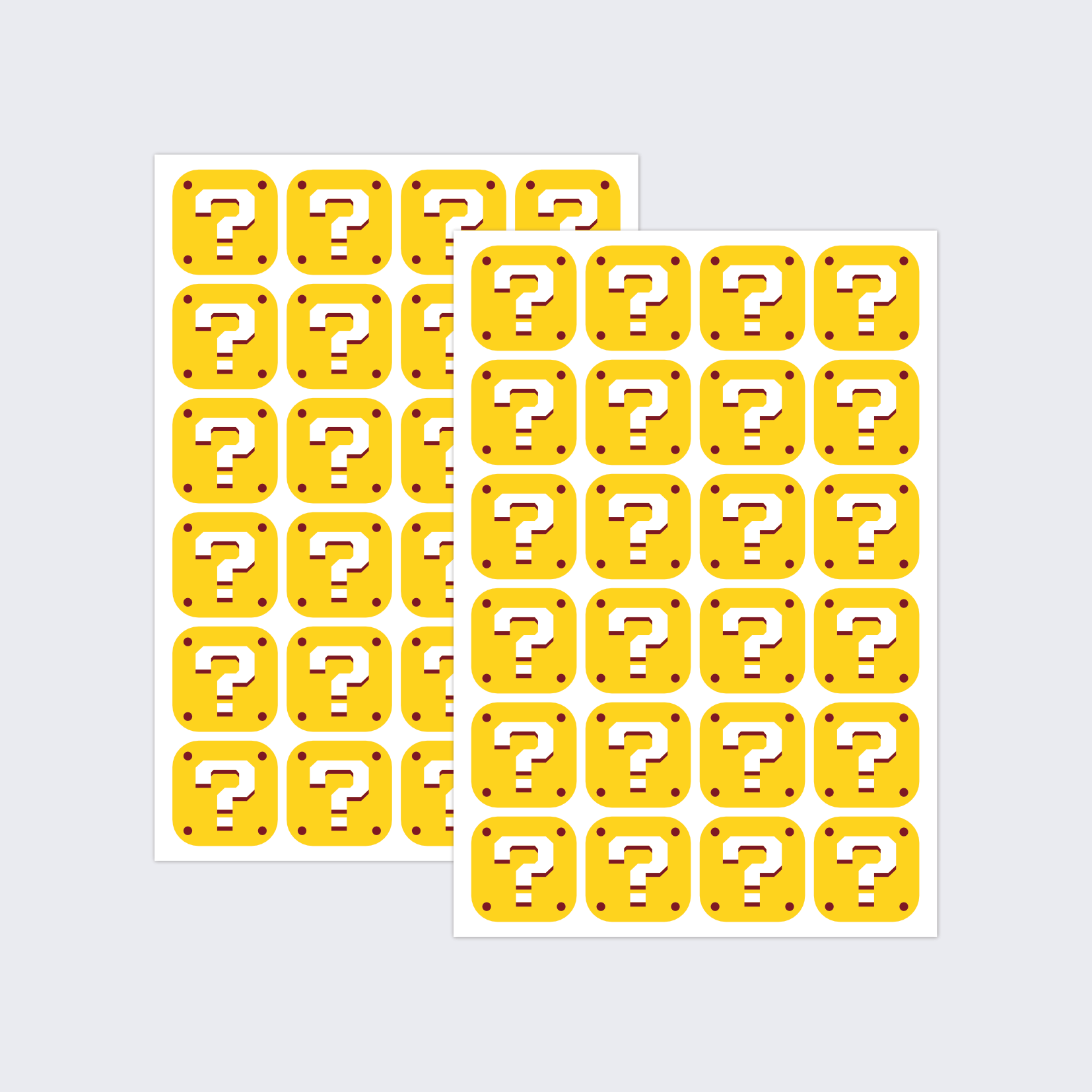 Two sheets of stickers in the style of the Super Mario question blocks.