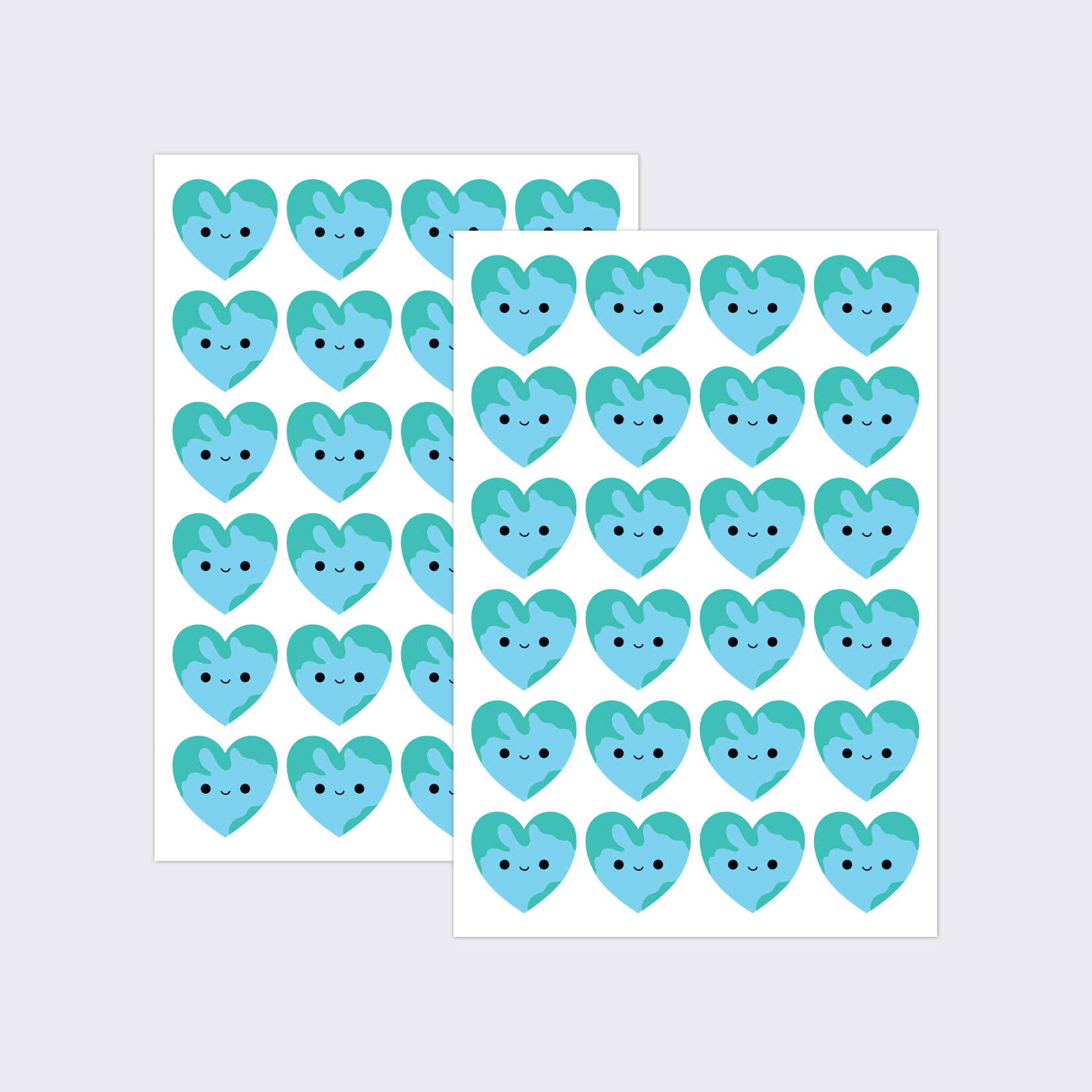 Two sheets of heart-shaped stickers with a smiling Earth design.