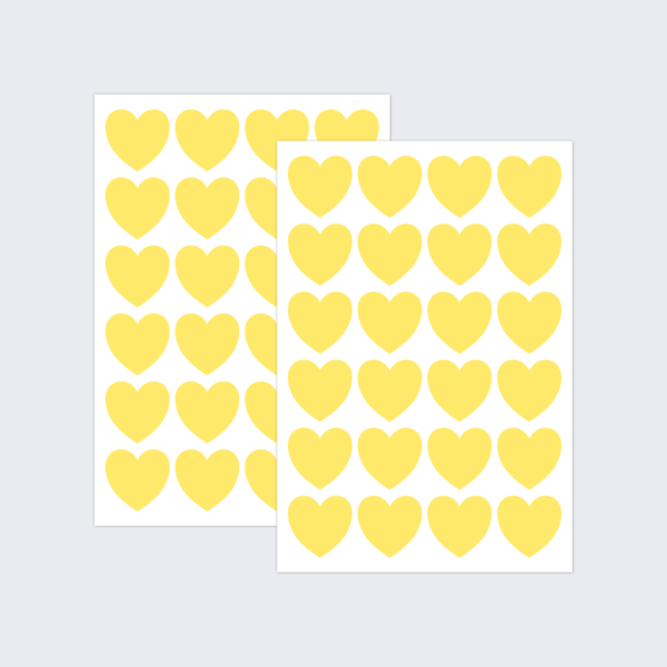 Two sheets of yellow stickers in heart shapes.